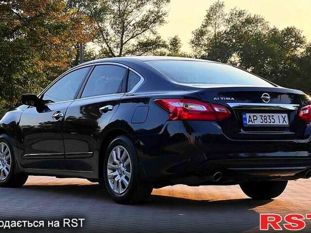 Черный Ниссан Альтима, объемом двигателя 2.5 л и пробегом 94 тыс. км за 9500 $, фото 6 на Automoto.ua