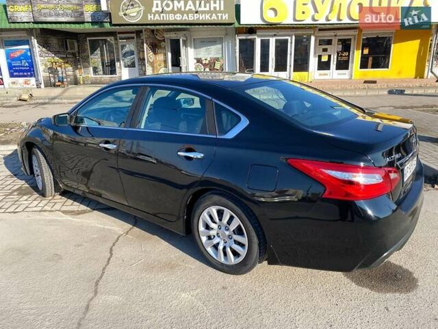 Черный Ниссан Альтима, объемом двигателя 2.49 л и пробегом 153 тыс. км за 8650 $, фото 1 на Automoto.ua