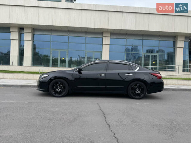 Черный Ниссан Альтима, объемом двигателя 2.49 л и пробегом 226 тыс. км за 10800 $, фото 23 на Automoto.ua