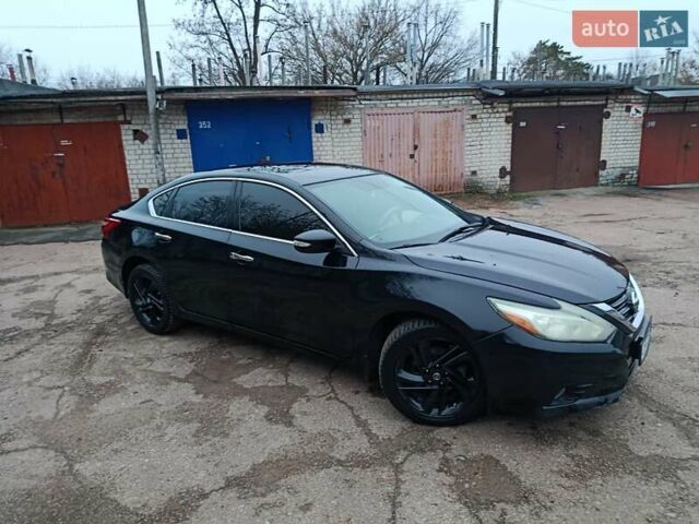 Чорний Ніссан Альтіма, об'ємом двигуна 2.49 л та пробігом 129 тис. км за 11700 $, фото 6 на Automoto.ua