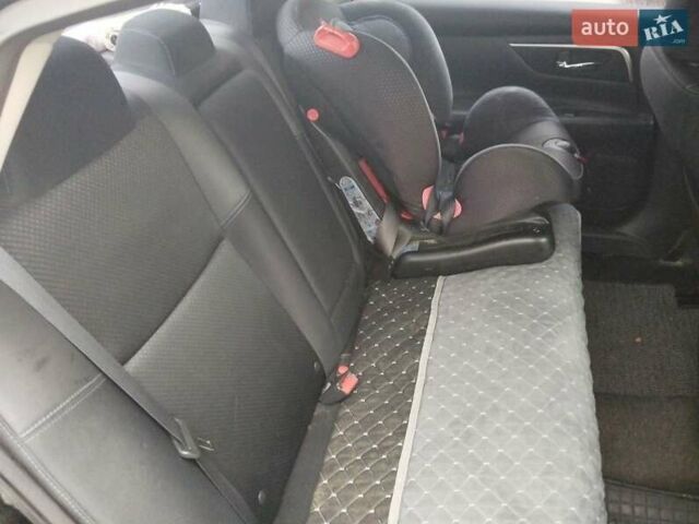 Чорний Ніссан Альтіма, об'ємом двигуна 2.5 л та пробігом 110 тис. км за 9800 $, фото 4 на Automoto.ua