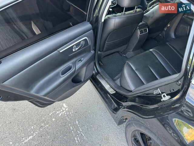 Черный Ниссан Альтима, объемом двигателя 2.49 л и пробегом 226 тыс. км за 10800 $, фото 17 на Automoto.ua