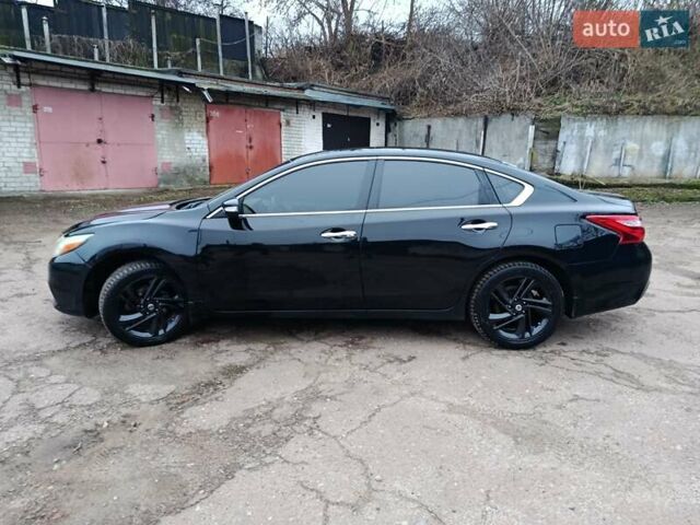 Чорний Ніссан Альтіма, об'ємом двигуна 2.49 л та пробігом 129 тис. км за 11700 $, фото 1 на Automoto.ua
