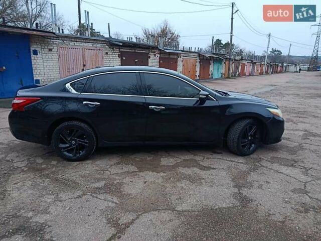 Чорний Ніссан Альтіма, об'ємом двигуна 2.49 л та пробігом 129 тис. км за 11700 $, фото 5 на Automoto.ua