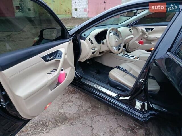 Чорний Ніссан Альтіма, об'ємом двигуна 2.49 л та пробігом 129 тис. км за 11700 $, фото 9 на Automoto.ua