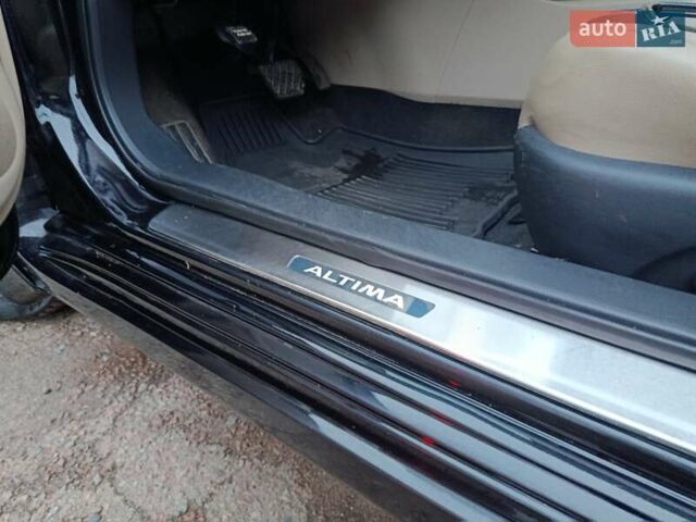 Чорний Ніссан Альтіма, об'ємом двигуна 2.49 л та пробігом 129 тис. км за 11700 $, фото 23 на Automoto.ua