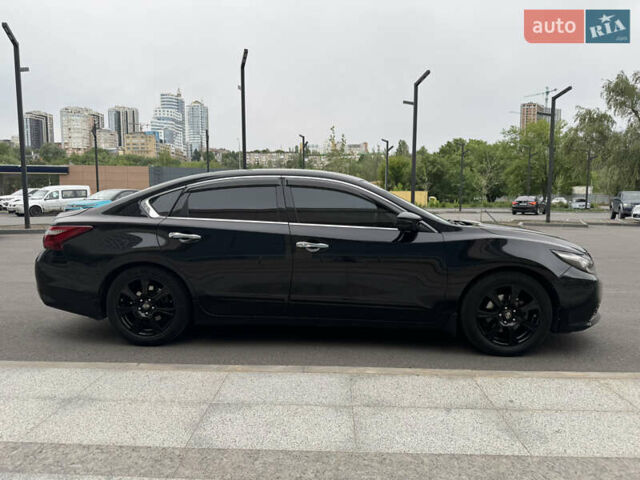 Черный Ниссан Альтима, объемом двигателя 2.49 л и пробегом 226 тыс. км за 10800 $, фото 24 на Automoto.ua