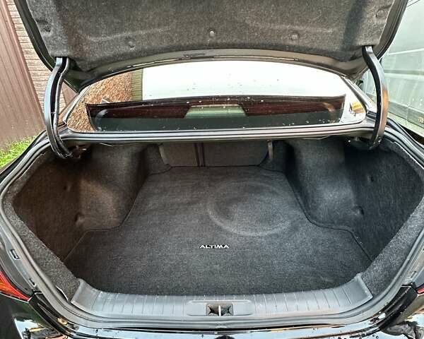 Черный Ниссан Альтима, объемом двигателя 2.49 л и пробегом 145 тыс. км за 12500 $, фото 44 на Automoto.ua