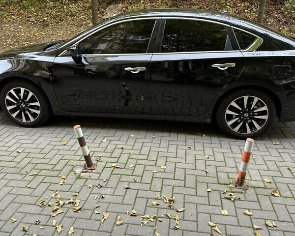 Черный Ниссан Альтима, объемом двигателя 2.49 л и пробегом 142 тыс. км за 11500 $, фото 5 на Automoto.ua