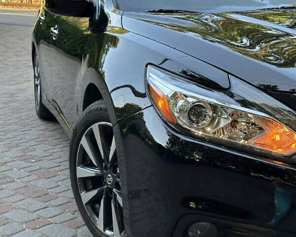 Черный Ниссан Альтима, объемом двигателя 2.49 л и пробегом 200 тыс. км за 10500 $, фото 3 на Automoto.ua