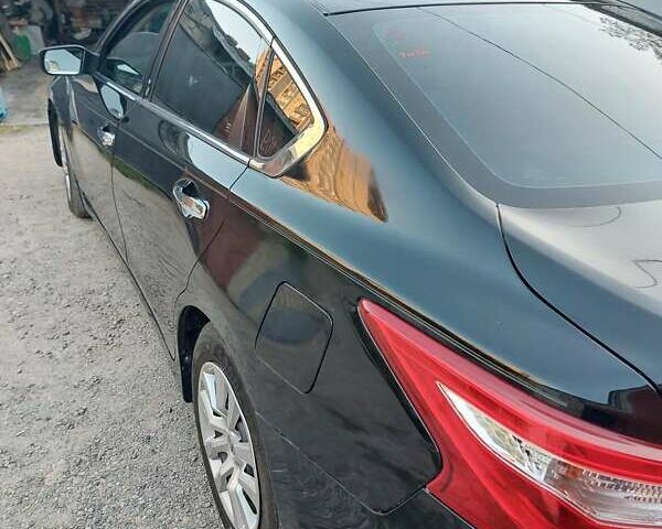 Черный Ниссан Альтима, объемом двигателя 2.49 л и пробегом 142 тыс. км за 10500 $, фото 1 на Automoto.ua