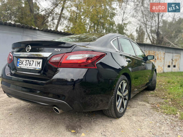 Черный Ниссан Альтима, объемом двигателя 2.49 л и пробегом 171 тыс. км за 8888 $, фото 17 на Automoto.ua