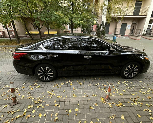 Черный Ниссан Альтима, объемом двигателя 2.49 л и пробегом 142 тыс. км за 11500 $, фото 7 на Automoto.ua