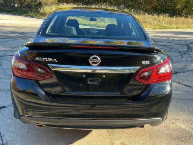 Черный Ниссан Альтима, объемом двигателя 2.5 л и пробегом 68 тыс. км за 9500 $, фото 6 на Automoto.ua