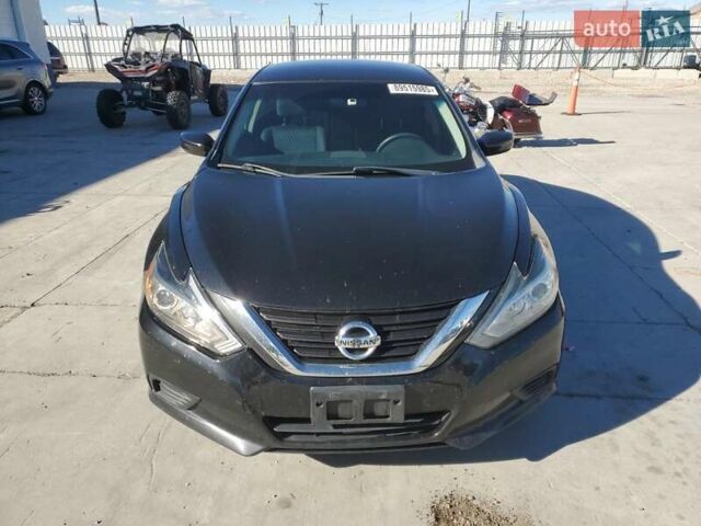 Черный Ниссан Альтима, объемом двигателя 2.49 л и пробегом 129 тыс. км за 1300 $, фото 4 на Automoto.ua