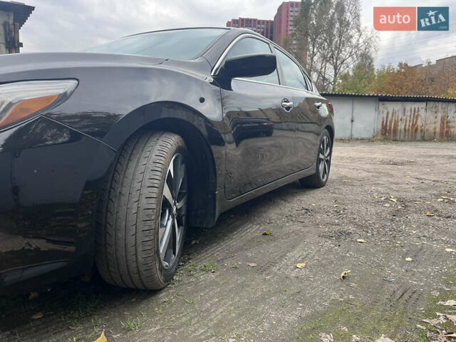 Черный Ниссан Альтима, объемом двигателя 2.49 л и пробегом 171 тыс. км за 8888 $, фото 9 на Automoto.ua