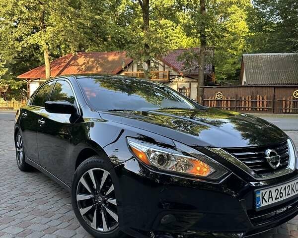 Черный Ниссан Альтима, объемом двигателя 2.49 л и пробегом 145 тыс. км за 12500 $, фото 7 на Automoto.ua