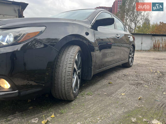 Черный Ниссан Альтима, объемом двигателя 2.49 л и пробегом 171 тыс. км за 8888 $, фото 8 на Automoto.ua