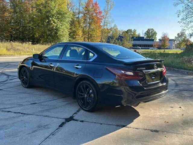 Черный Ниссан Альтима, объемом двигателя 2.5 л и пробегом 68 тыс. км за 9500 $, фото 7 на Automoto.ua