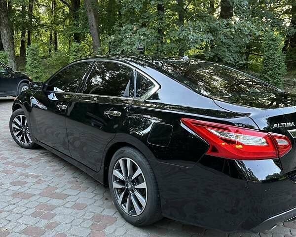 Черный Ниссан Альтима, объемом двигателя 2.49 л и пробегом 145 тыс. км за 12500 $, фото 15 на Automoto.ua