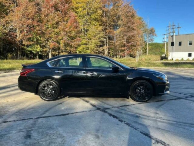 Черный Ниссан Альтима, объемом двигателя 2.5 л и пробегом 68 тыс. км за 9500 $, фото 4 на Automoto.ua