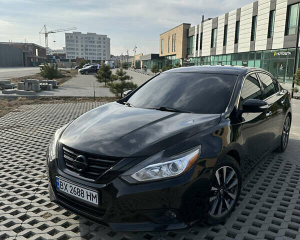 Чорний Ніссан Альтіма, об'ємом двигуна 2.49 л та пробігом 134 тис. км за 10600 $, фото 11 на Automoto.ua