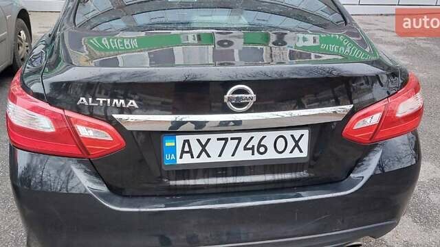 Черный Ниссан Альтима, объемом двигателя 2.49 л и пробегом 142 тыс. км за 10500 $, фото 6 на Automoto.ua
