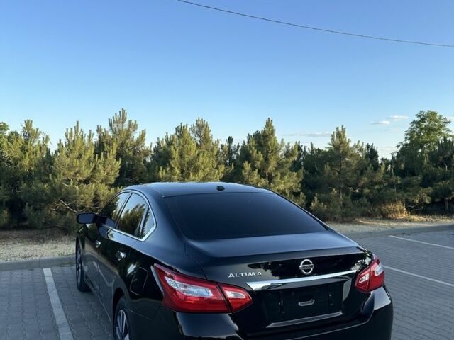 Черный Ниссан Альтима, объемом двигателя 2.5 л и пробегом 163 тыс. км за 9100 $, фото 3 на Automoto.ua