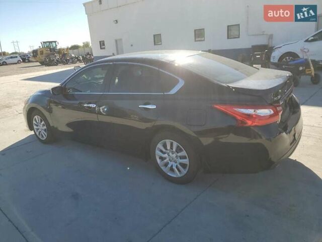 Черный Ниссан Альтима, объемом двигателя 2.49 л и пробегом 129 тыс. км за 1300 $, фото 1 на Automoto.ua