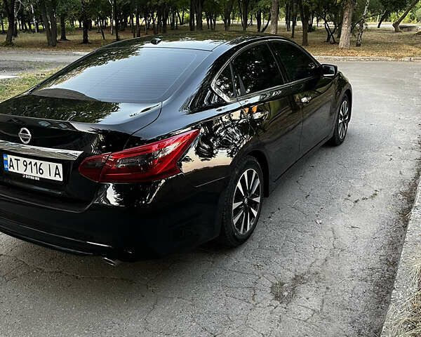 Черный Ниссан Альтима, объемом двигателя 2.49 л и пробегом 139 тыс. км за 11850 $, фото 6 на Automoto.ua