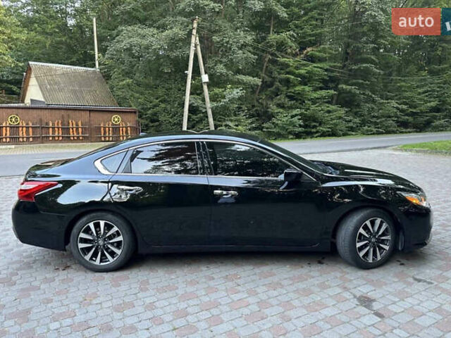 Черный Ниссан Альтима, объемом двигателя 2.49 л и пробегом 200 тыс. км за 10500 $, фото 4 на Automoto.ua