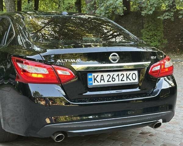 Черный Ниссан Альтима, объемом двигателя 2.49 л и пробегом 145 тыс. км за 12500 $, фото 14 на Automoto.ua