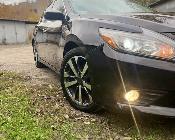 Черный Ниссан Альтима, объемом двигателя 2.49 л и пробегом 171 тыс. км за 8888 $, фото 5 на Automoto.ua