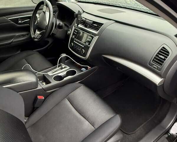 Черный Ниссан Альтима, объемом двигателя 2.49 л и пробегом 162 тыс. км за 13400 $, фото 9 на Automoto.ua