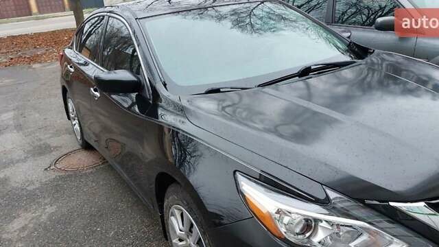 Черный Ниссан Альтима, объемом двигателя 2.49 л и пробегом 142 тыс. км за 10500 $, фото 2 на Automoto.ua