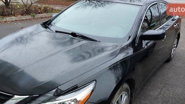 Черный Ниссан Альтима, объемом двигателя 2.49 л и пробегом 142 тыс. км за 10500 $, фото 4 на Automoto.ua