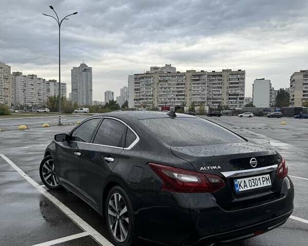 Черный Ниссан Альтима, объемом двигателя 2.49 л и пробегом 162 тыс. км за 13400 $, фото 2 на Automoto.ua