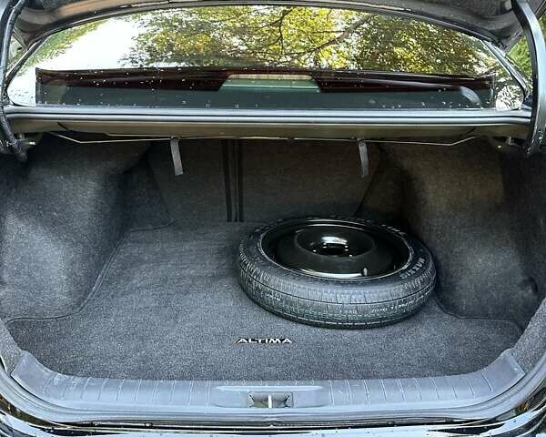 Черный Ниссан Альтима, объемом двигателя 2.49 л и пробегом 145 тыс. км за 12500 $, фото 45 на Automoto.ua