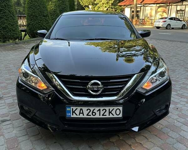 Черный Ниссан Альтима, объемом двигателя 2.49 л и пробегом 145 тыс. км за 12500 $, фото 2 на Automoto.ua