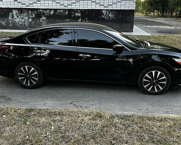 Черный Ниссан Альтима, объемом двигателя 2.49 л и пробегом 139 тыс. км за 11850 $, фото 5 на Automoto.ua