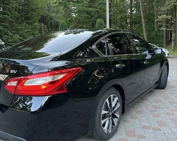 Черный Ниссан Альтима, объемом двигателя 2.49 л и пробегом 145 тыс. км за 12500 $, фото 12 на Automoto.ua