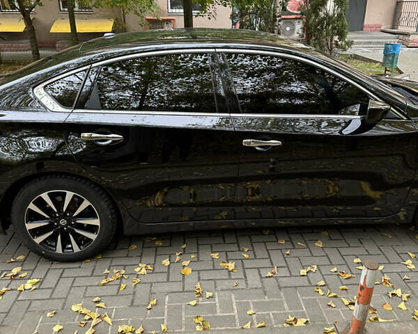 Черный Ниссан Альтима, объемом двигателя 2.49 л и пробегом 142 тыс. км за 11500 $, фото 13 на Automoto.ua