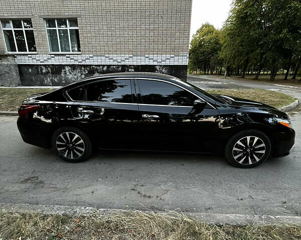 Черный Ниссан Альтима, объемом двигателя 2.49 л и пробегом 139 тыс. км за 11850 $, фото 4 на Automoto.ua