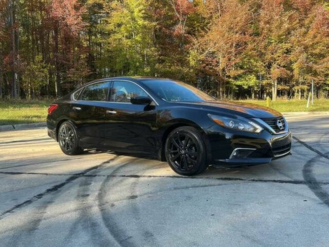 Черный Ниссан Альтима, объемом двигателя 2.5 л и пробегом 68 тыс. км за 9500 $, фото 2 на Automoto.ua