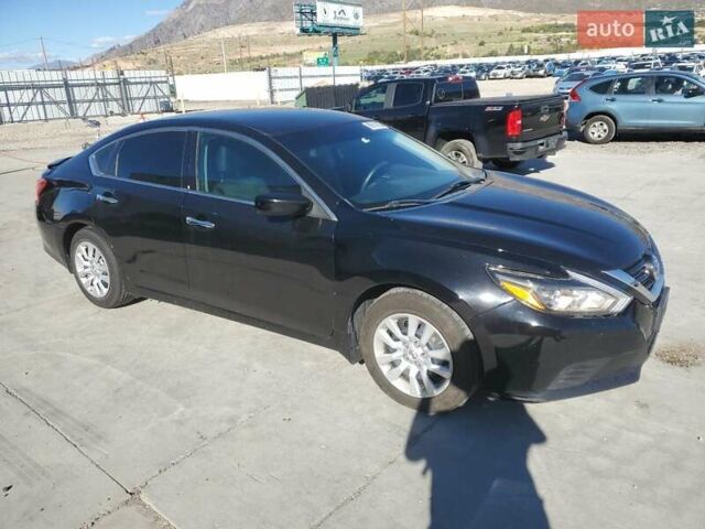 Черный Ниссан Альтима, объемом двигателя 2.49 л и пробегом 129 тыс. км за 1300 $, фото 3 на Automoto.ua