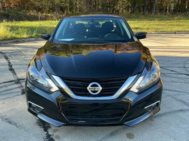 Черный Ниссан Альтима, объемом двигателя 2.5 л и пробегом 68 тыс. км за 9500 $, фото 1 на Automoto.ua