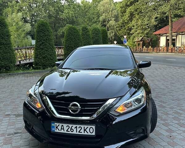 Черный Ниссан Альтима, объемом двигателя 2.49 л и пробегом 145 тыс. км за 12500 $, фото 1 на Automoto.ua