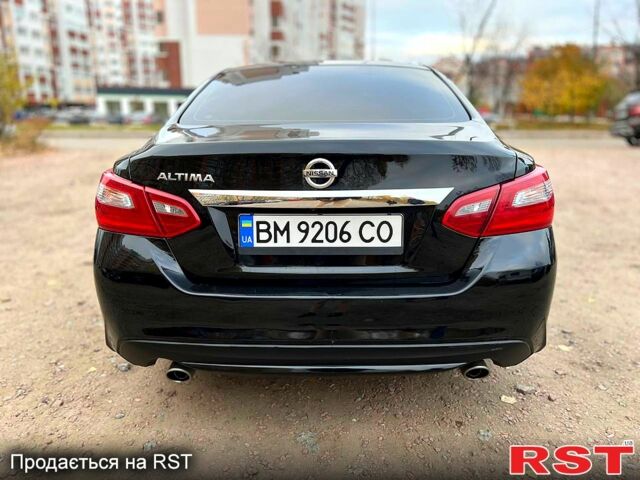 Черный Ниссан Альтима, объемом двигателя 2.5 л и пробегом 96 тыс. км за 10500 $, фото 5 на Automoto.ua