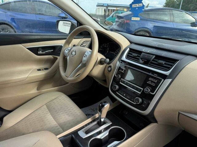 Черный Ниссан Альтима, объемом двигателя 2.5 л и пробегом 175 тыс. км за 8000 $, фото 6 на Automoto.ua