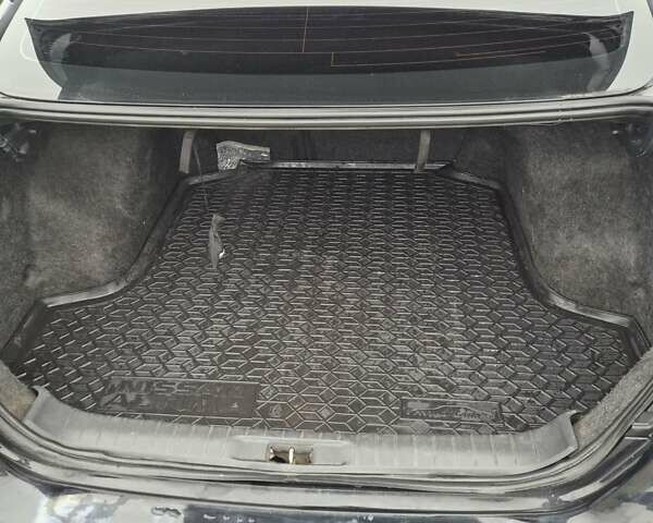 Черный Ниссан Альтима, объемом двигателя 2.49 л и пробегом 224 тыс. км за 11500 $, фото 7 на Automoto.ua